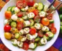 Tomato Cucumber Avocado Salad with Mozzarella and Basil Pesto