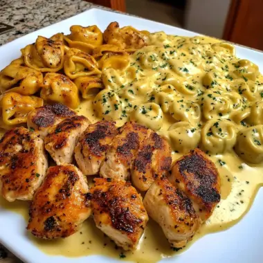 Cheesy Garlic Cajun Chicken Tortellini with Velveeta Cream Sauce