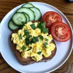 Creamy Scrambled Egg Toast with Fresh Cucumber & Tomato Slices